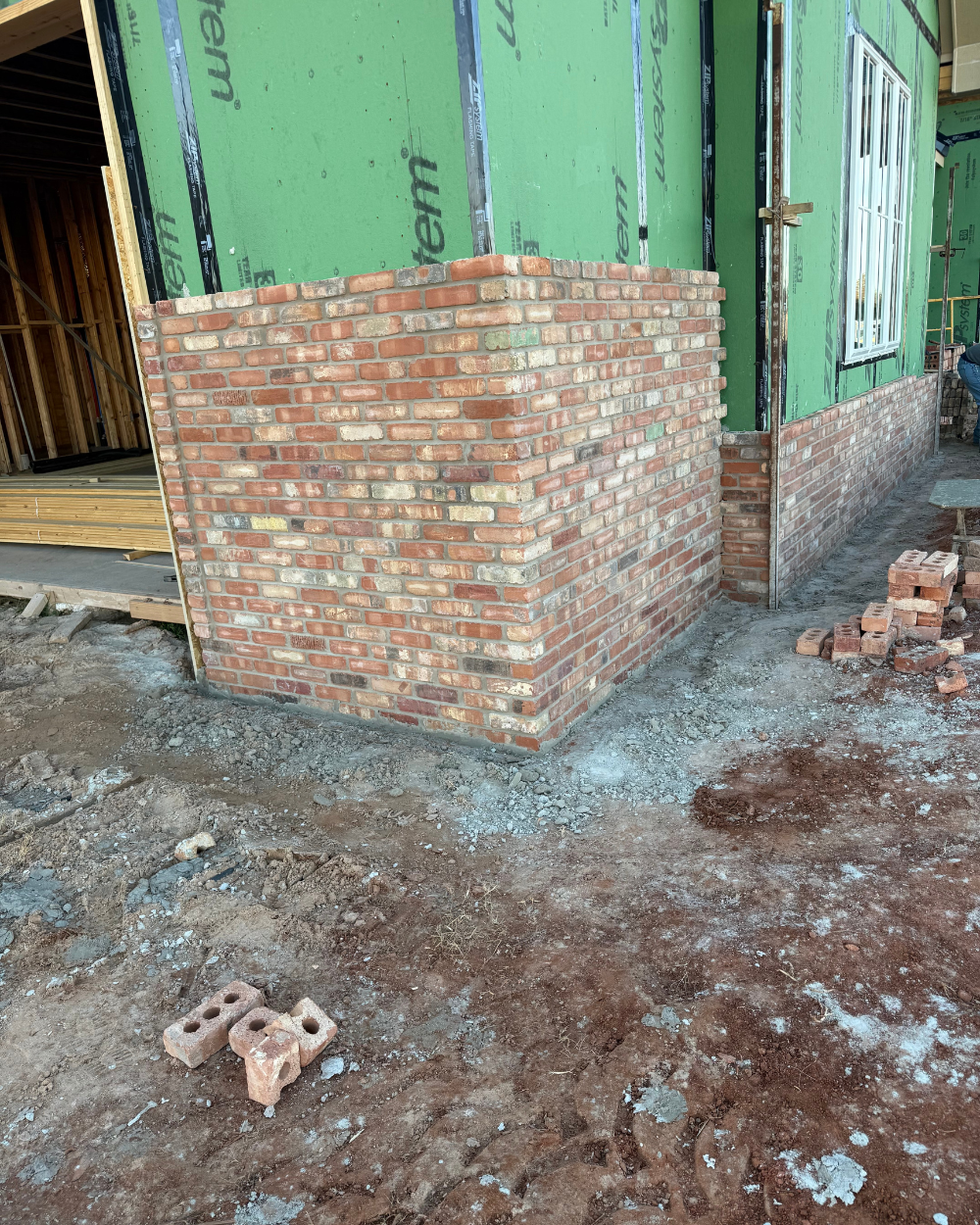 Close-up of reclaimed-look tumbled brick on Grace on 5 residential project in Edmond Oklahoma