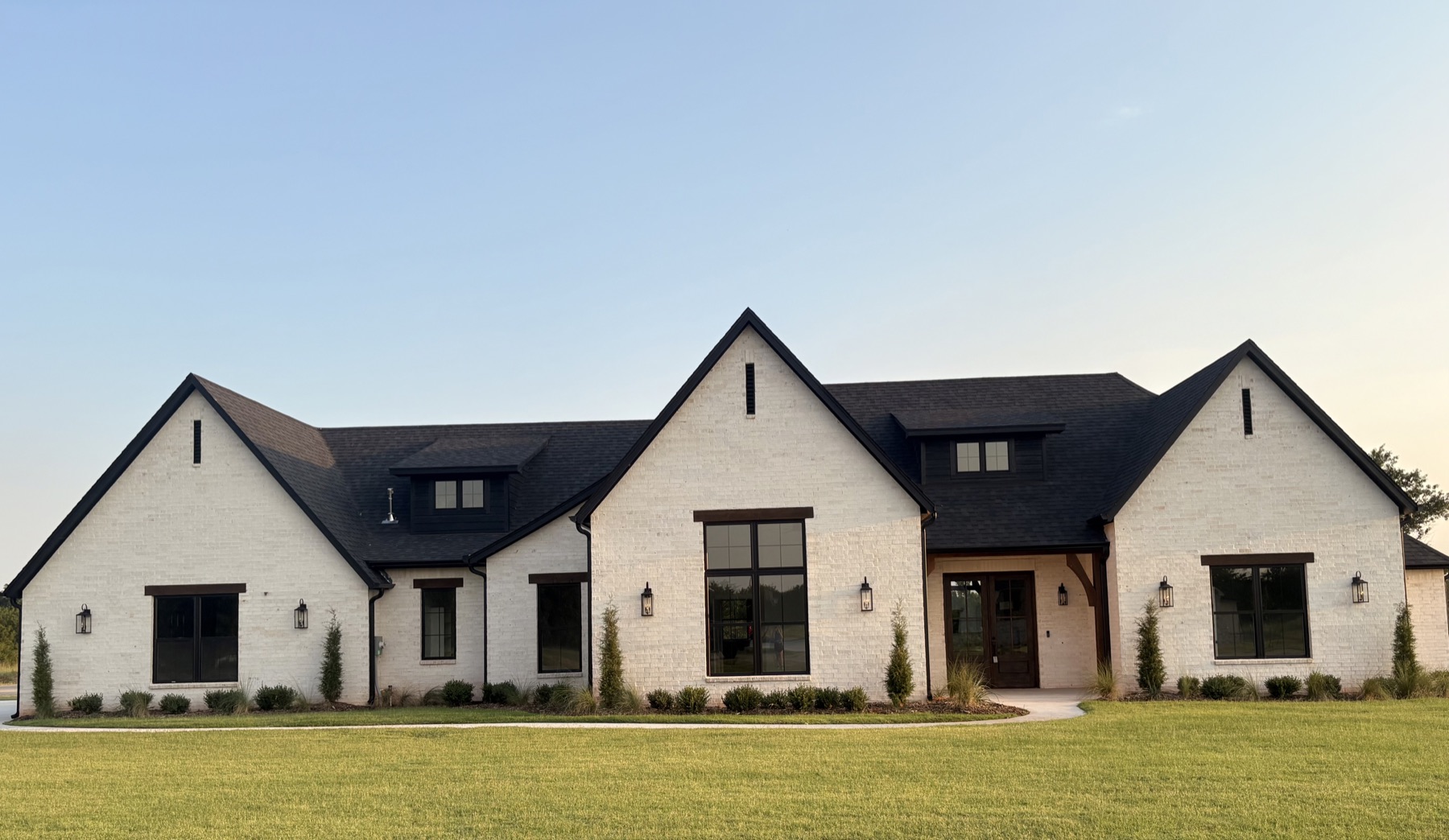 Mooremaker Construction home in Stillwater featuring US Brick Belle Meade with white mortar.