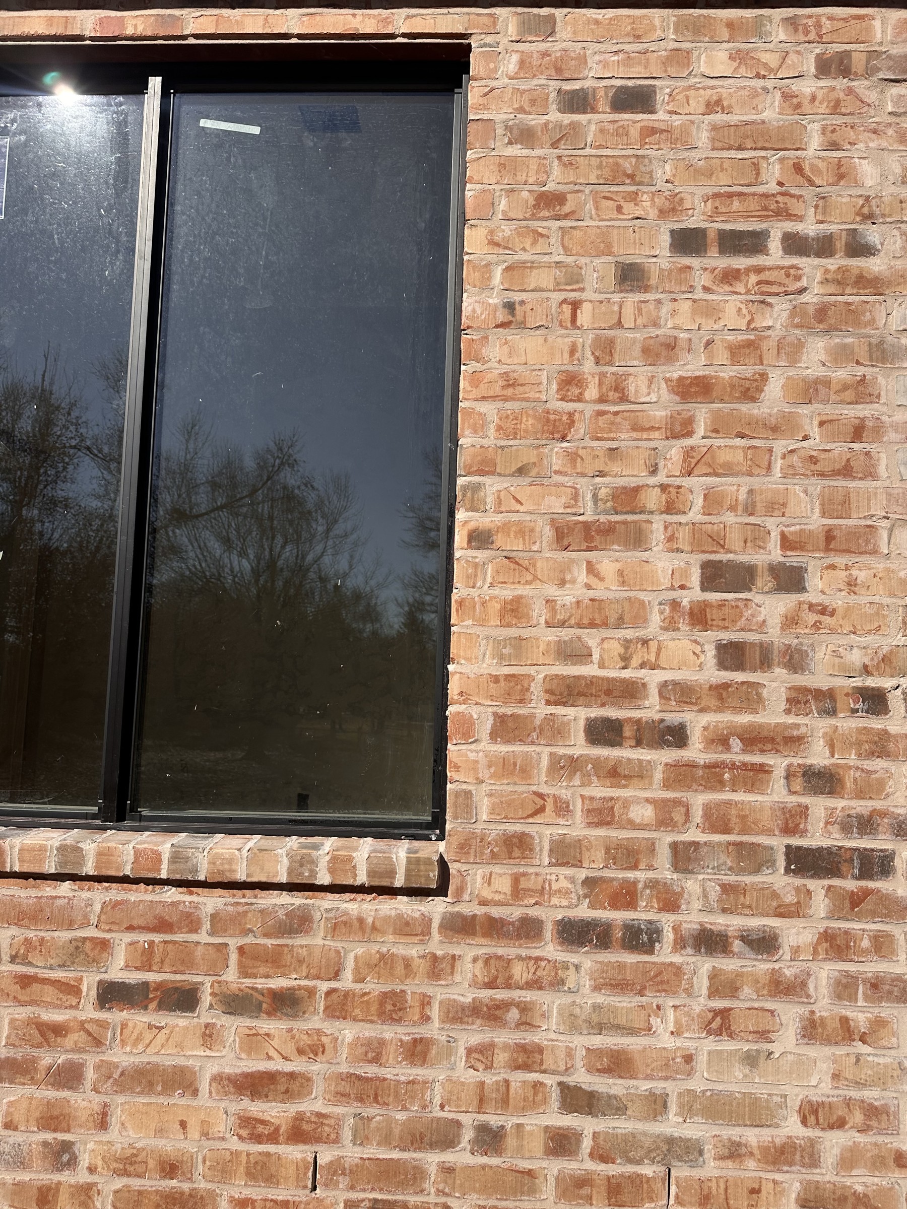 Mangum Brick Charleston with Ivory Buff mortar around an exterior window