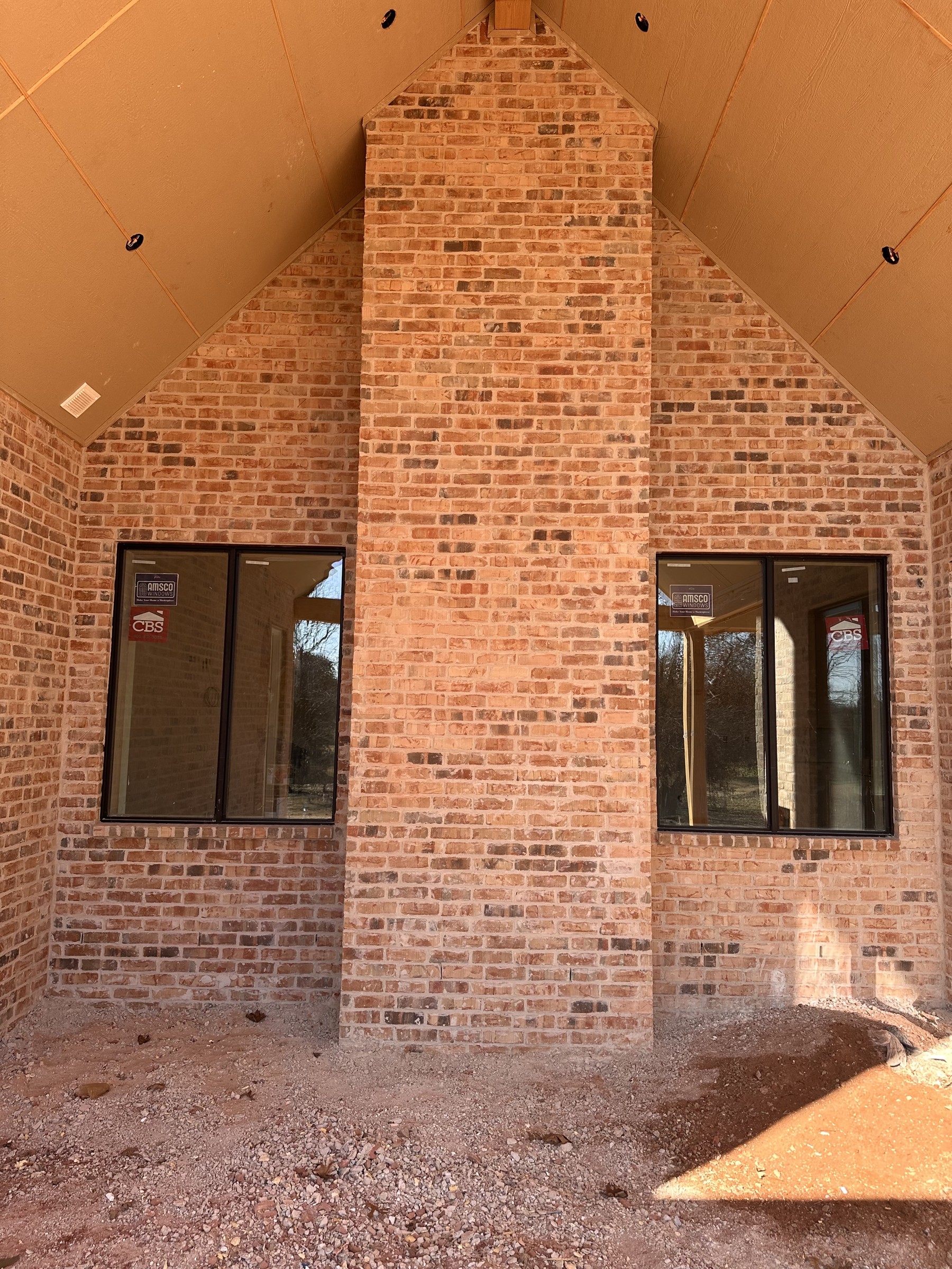 Covered exterior featuring Mangum Brick Charleston with Ivory Buff mortar
